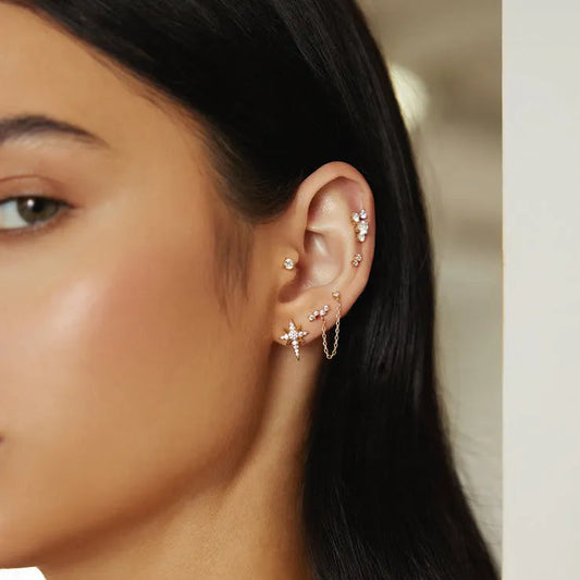 #5 DAINTY SIL CZ STAR STUDS