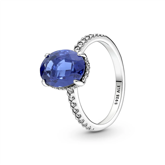 Sterling silver ring with princess blue crystal and clear cubic zirconia