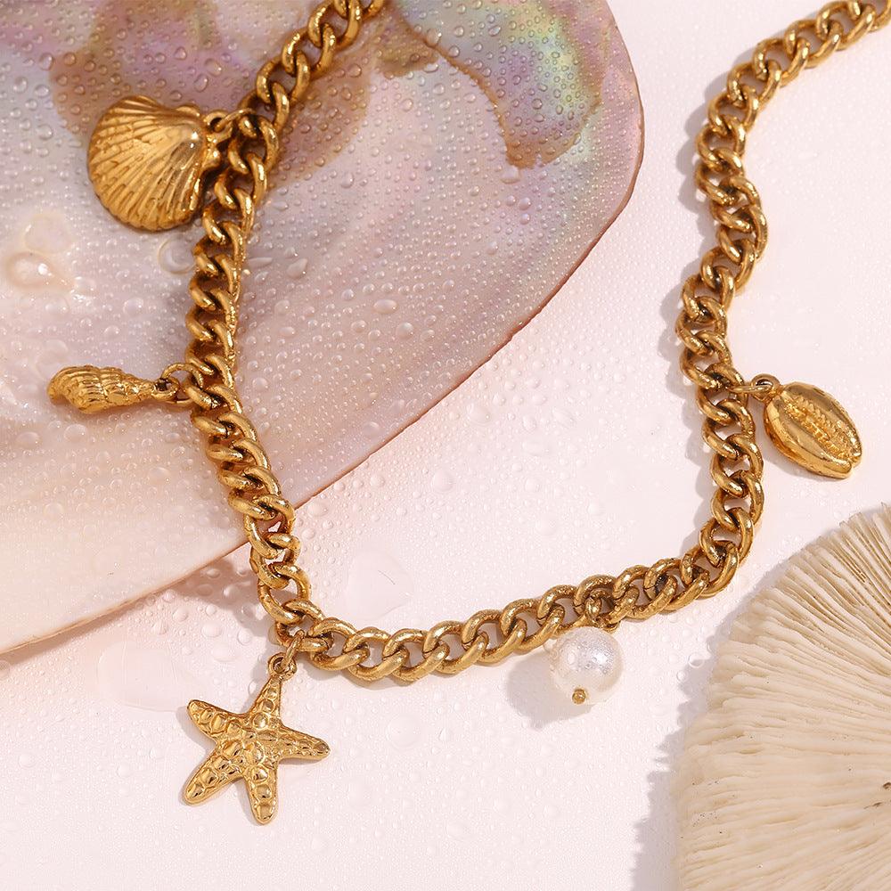 Trendy Gold Charm Bracelet with Seashell and Starfish Pendants – Link Chain for Women - Begum