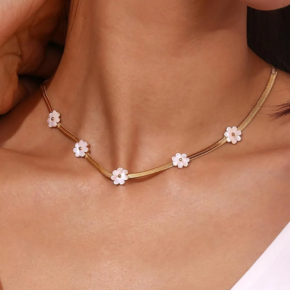 Trendy Gold Choker Necklace with White Flower Charms - Begum